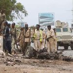 Somali soldiers take cover during Al-Shabaab attack