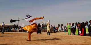 Tuareg dancer performs to the rhythm of tende