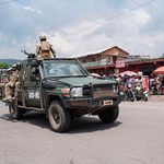 EACRF soldiers drive in Goma