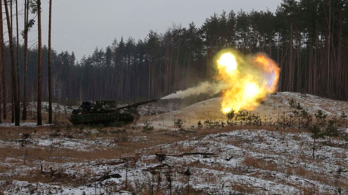 A Ukrainian tank fires at Russian positions