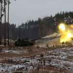 A Ukrainian tank fires at Russian positions