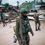 Armed DRC soldier patrol in Manzalaho near Beni
