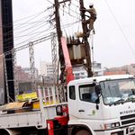 Umeme technicians at work in Kampala, Uganda.