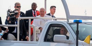 Pope Francis arrives for Mass at the N'Dolo Airport in Kinshasa