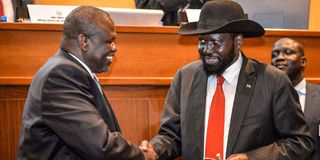  Salva Kiir (right) and Riek Machar