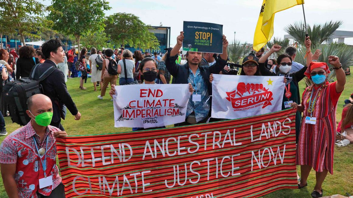 Climate activists protest during the COP27