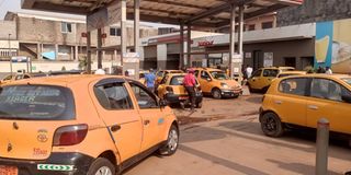 Taxis at a fuel station in Mendong, Yaoundé in Cameroon.