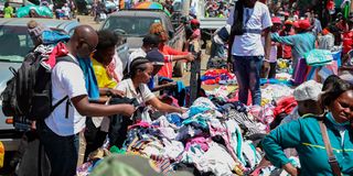 Kenyans buying second-hand clothes at Gikomba market 