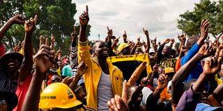 Supporters listen to Zimbabwe main opposition leader Nelson Chamisa 