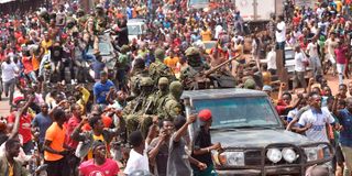 People celebrate in Conakry after coup