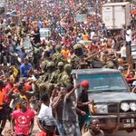 People celebrate in Conakry after coup
