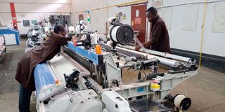 Workers at Thika Cloth Mills factory in Kenya