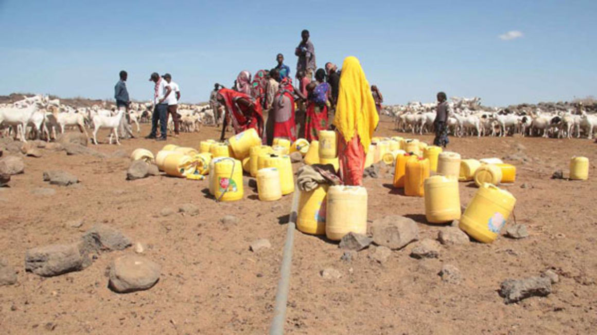 People queue for water in northern Kenya