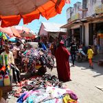 Traders sell their wares along a street in Somalia
