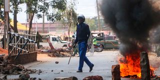 Anti-riot police officer on patrol in Nairobi