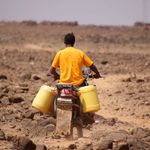 A man ferries water 