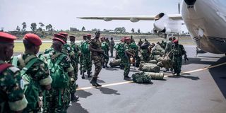 Burundian military personnel arrive at Goma airport