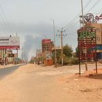 Smoke rises in the horizon in an area east of Khartoum