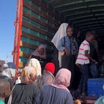 Sudanese families in a truck