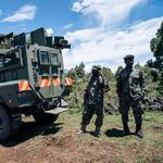 Ugandan soldiers from EACRF stand guard 