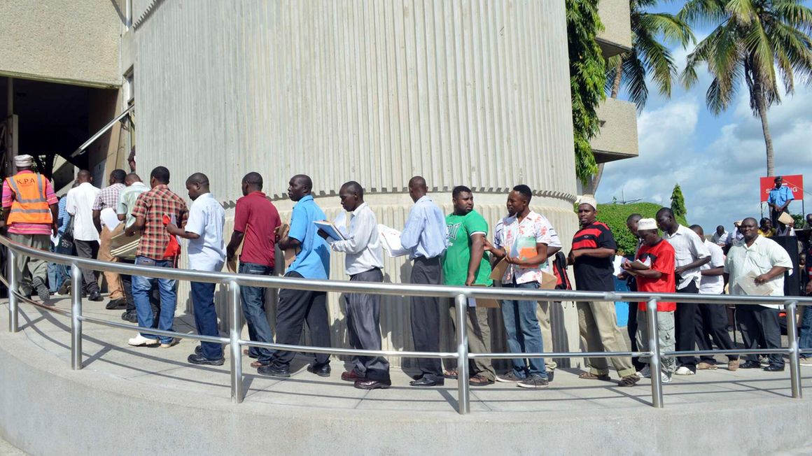 Job seekers queue for recruitment in Mombasa, Kenya.