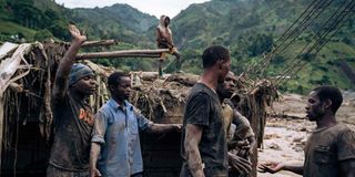 Residents of Nyamukubi stand amidst rubble 