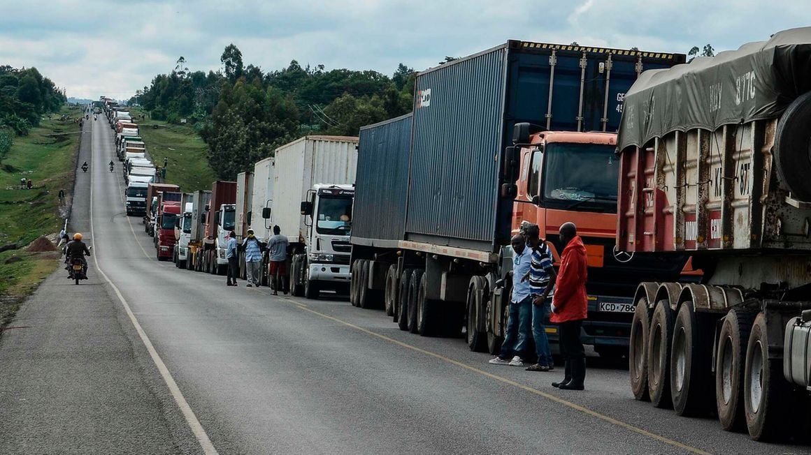 Trucks wait to enter Uganda at the Malaba border