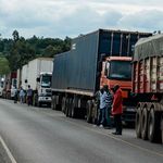 Trucks wait to enter Uganda at the Malaba border