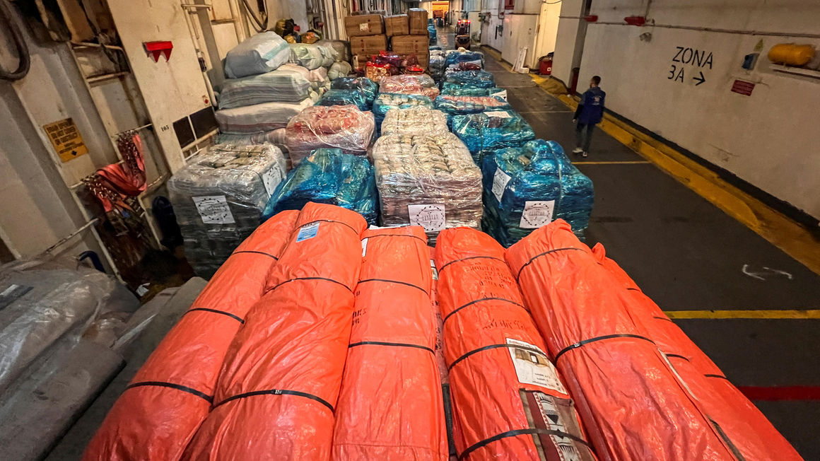 Humanitarian aid and food supplies for Gaza are seen inside a cargo ship, at the port of Misrata