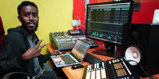 A student works on a professional production workstation at Music And Film Academy.